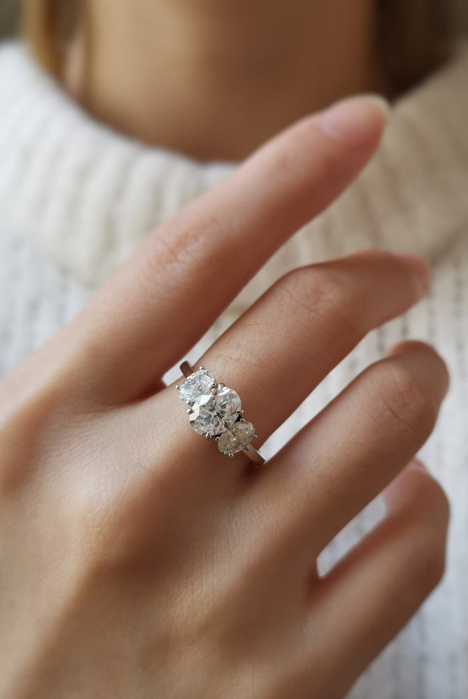1-50-ct-oval-shaped-moissanite-three-stone-engagement-ring