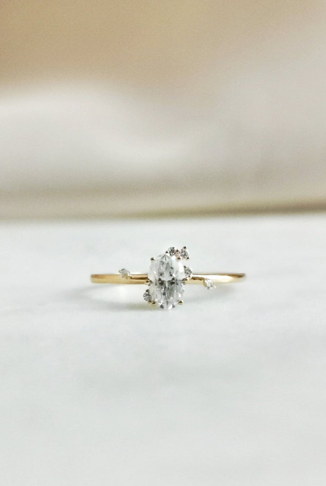 0-50-ct-oval-shaped-moissanite-cluster-engagement-ring