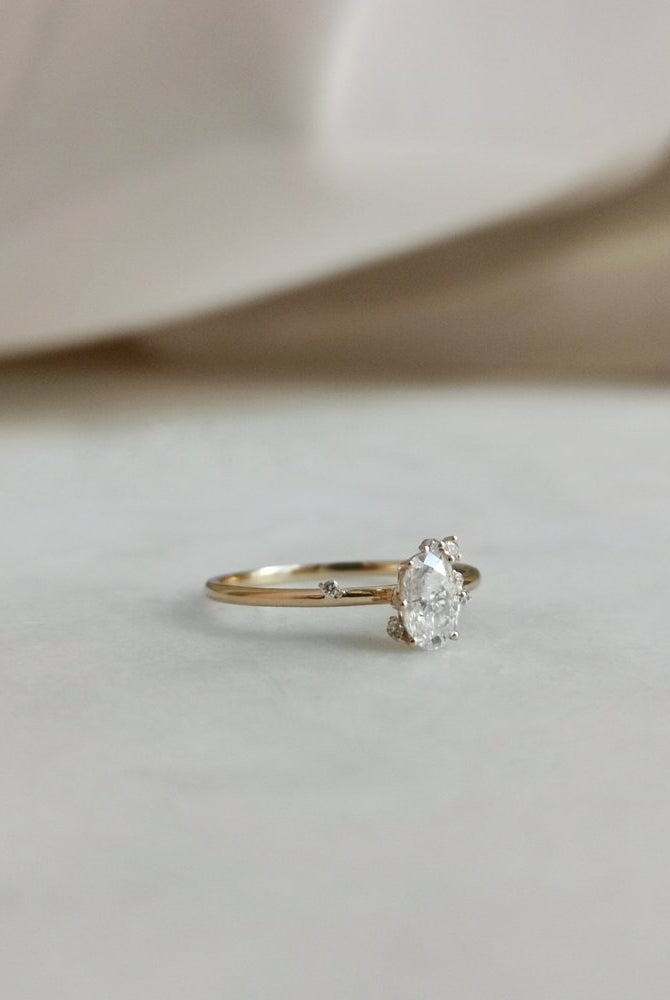 0-50-ct-oval-shaped-moissanite-cluster-engagement-ring