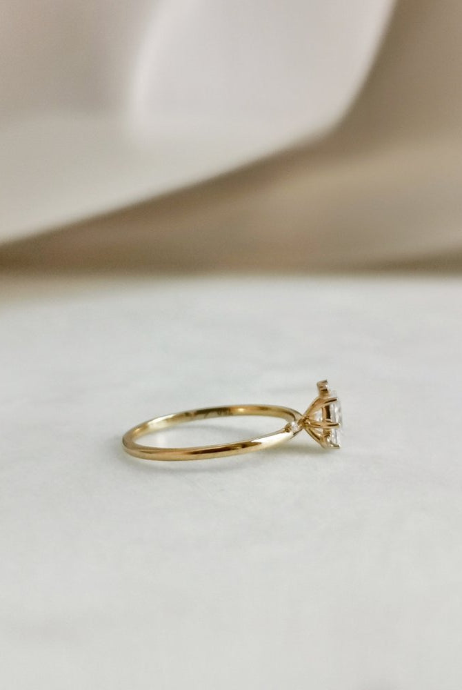 0-50-ct-oval-shaped-moissanite-cluster-engagement-ring