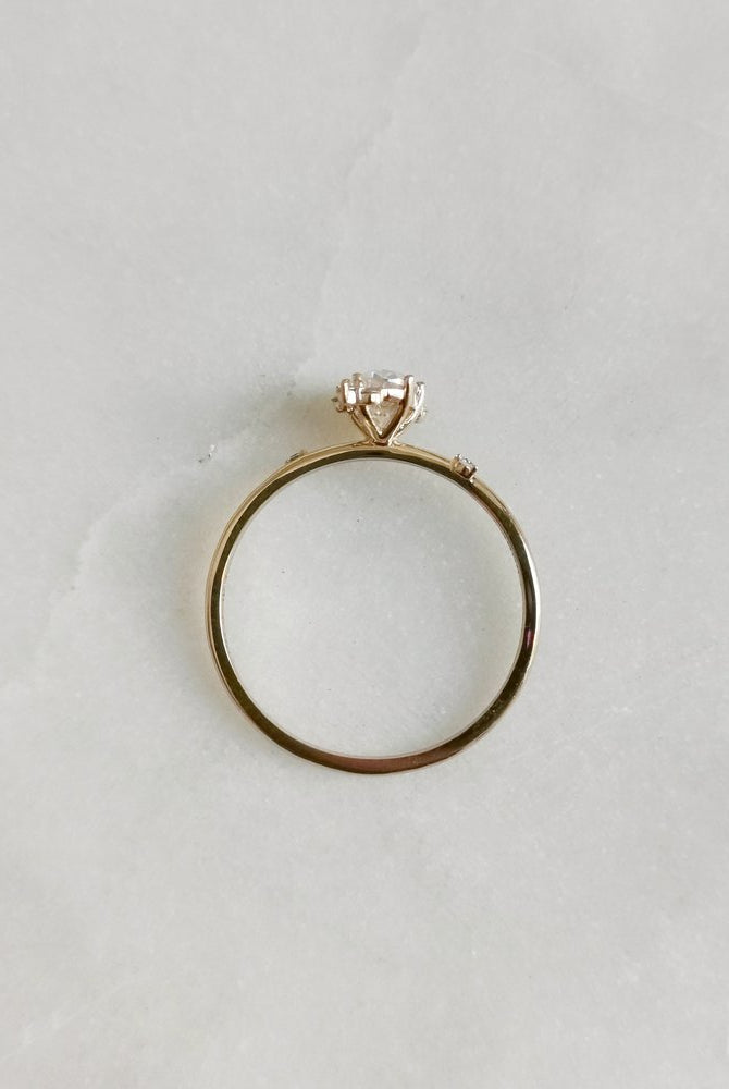 0-50-ct-oval-shaped-moissanite-cluster-engagement-ring