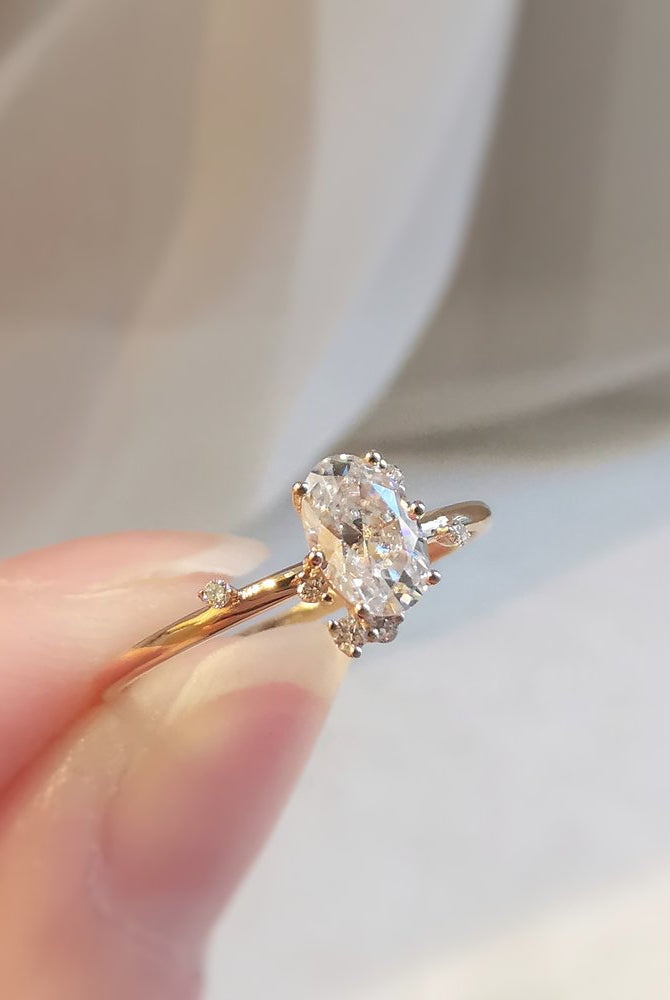0-50-ct-oval-shaped-moissanite-cluster-engagement-ring