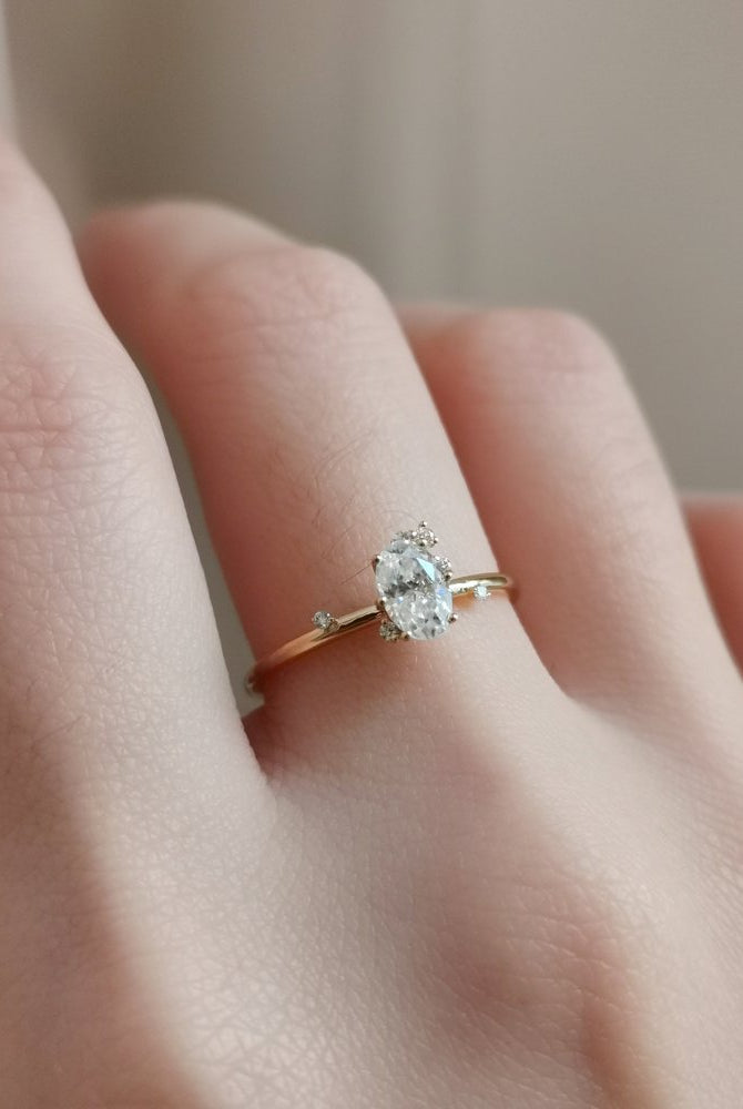 0-50-ct-oval-shaped-moissanite-cluster-engagement-ring