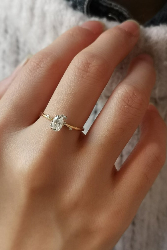 0-50-ct-oval-shaped-moissanite-cluster-engagement-ring