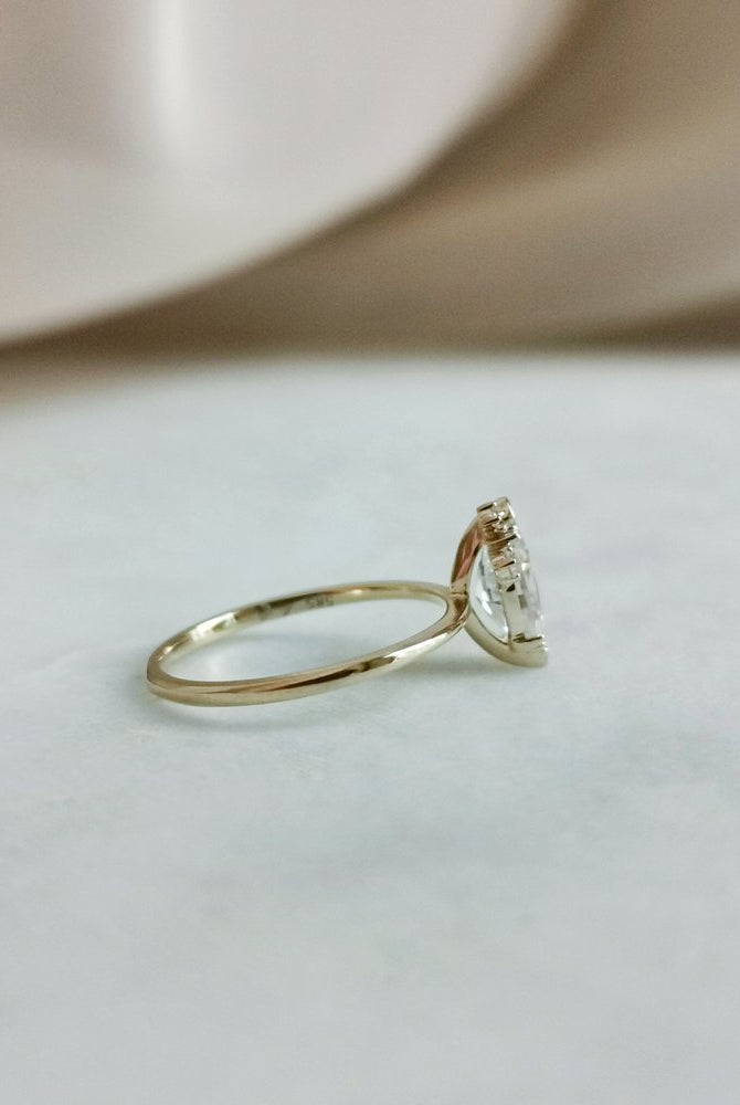 0-50-ct-oval-shaped-moissanite-cluster-engagement-ring