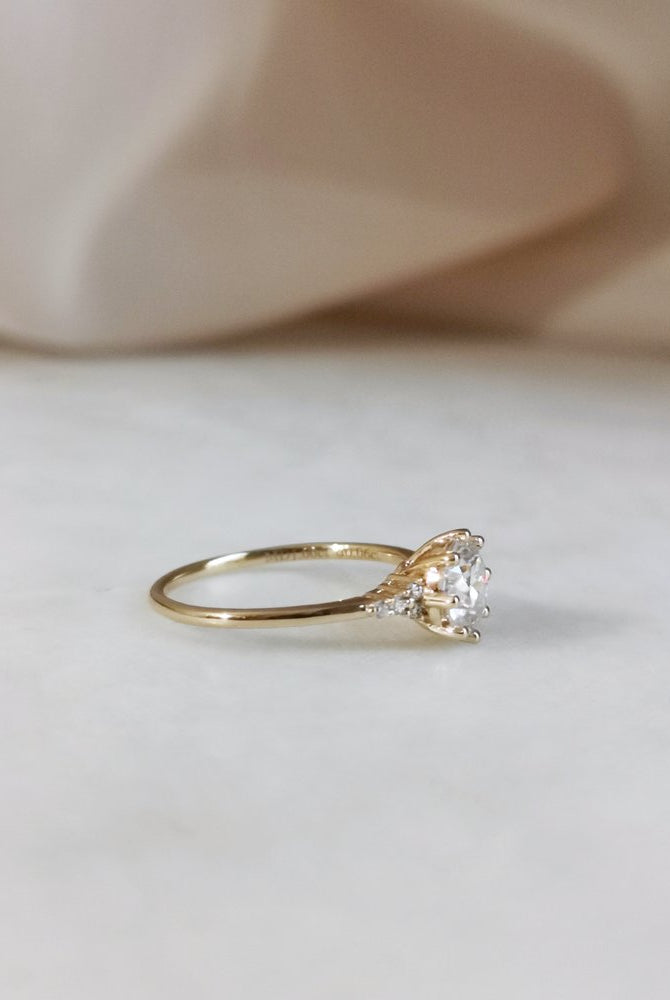 1-0-ct-round-shaped-moissanite-cluster-engagement-ring