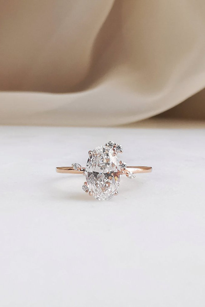 0-50-ct-oval-shaped-moissanite-cluster-engagement-ring
