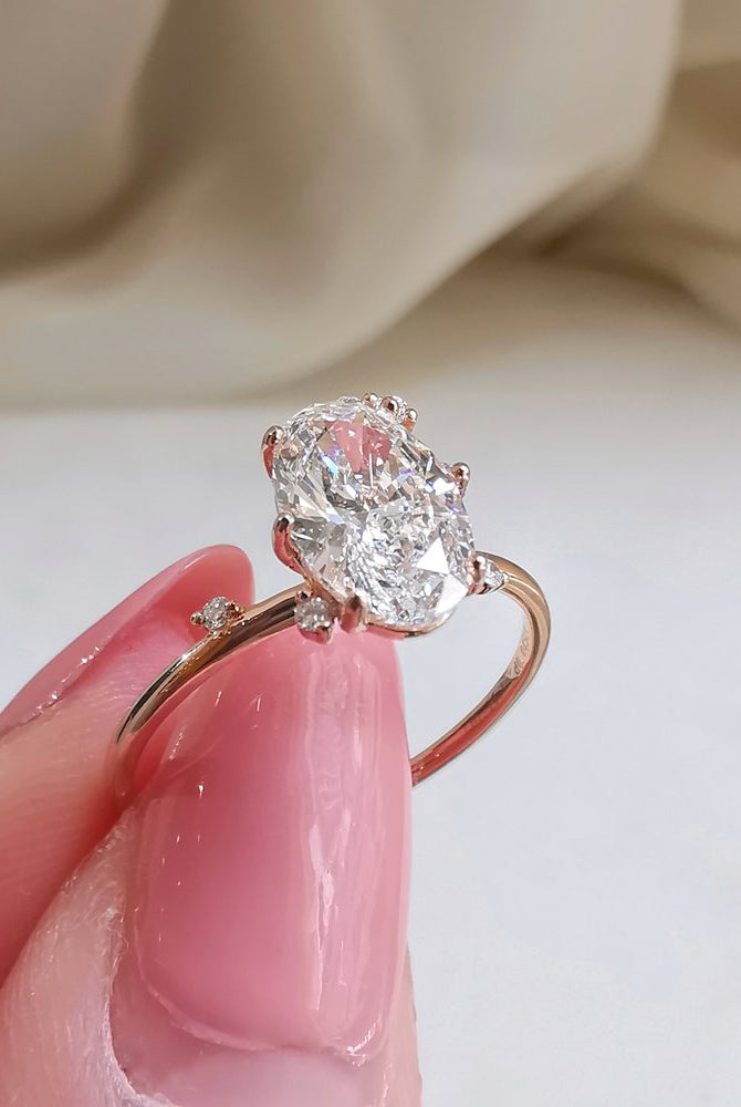 0-50-ct-oval-shaped-moissanite-cluster-engagement-ring