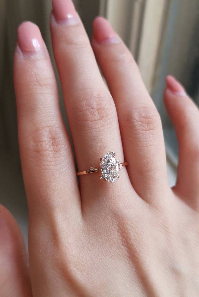 0-50-ct-oval-shaped-moissanite-cluster-engagement-ring