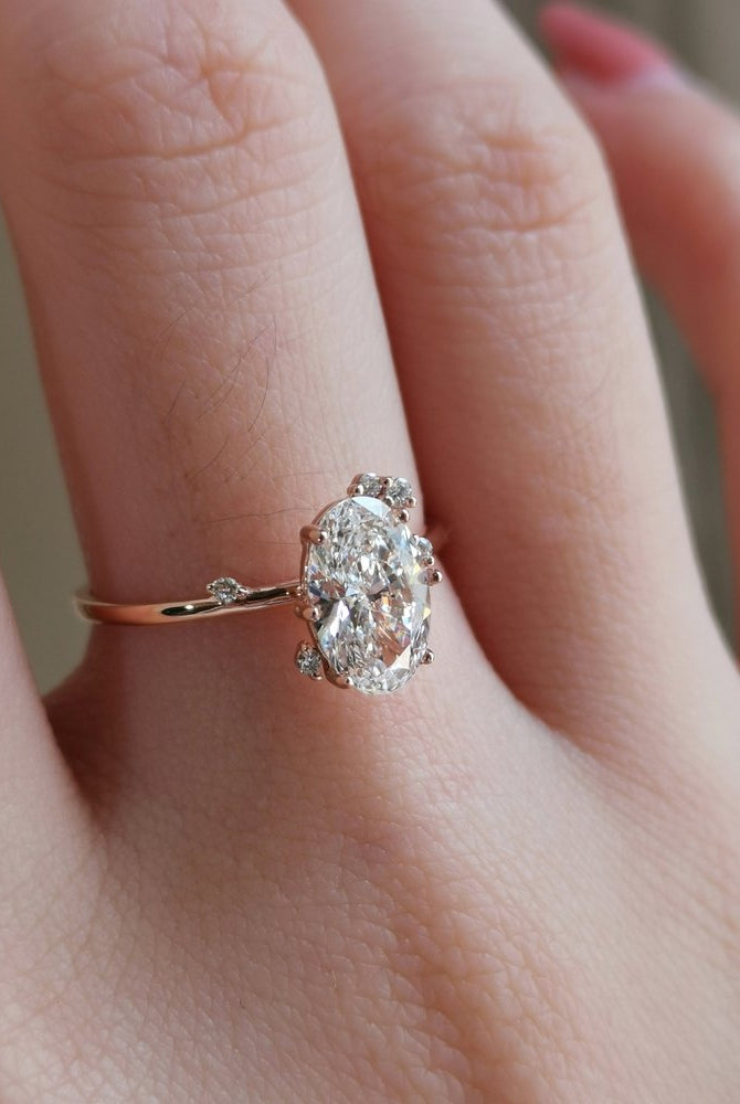 0-50-ct-oval-shaped-moissanite-cluster-engagement-ring