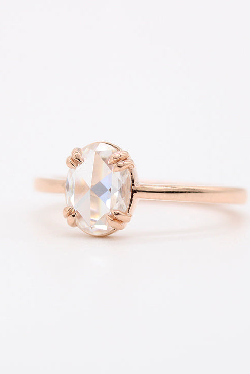 Moissanite engagement rings with hidden halo