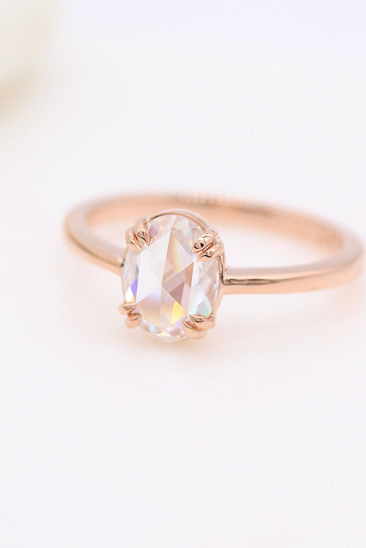 Moissanite engagement rings with baguette accents