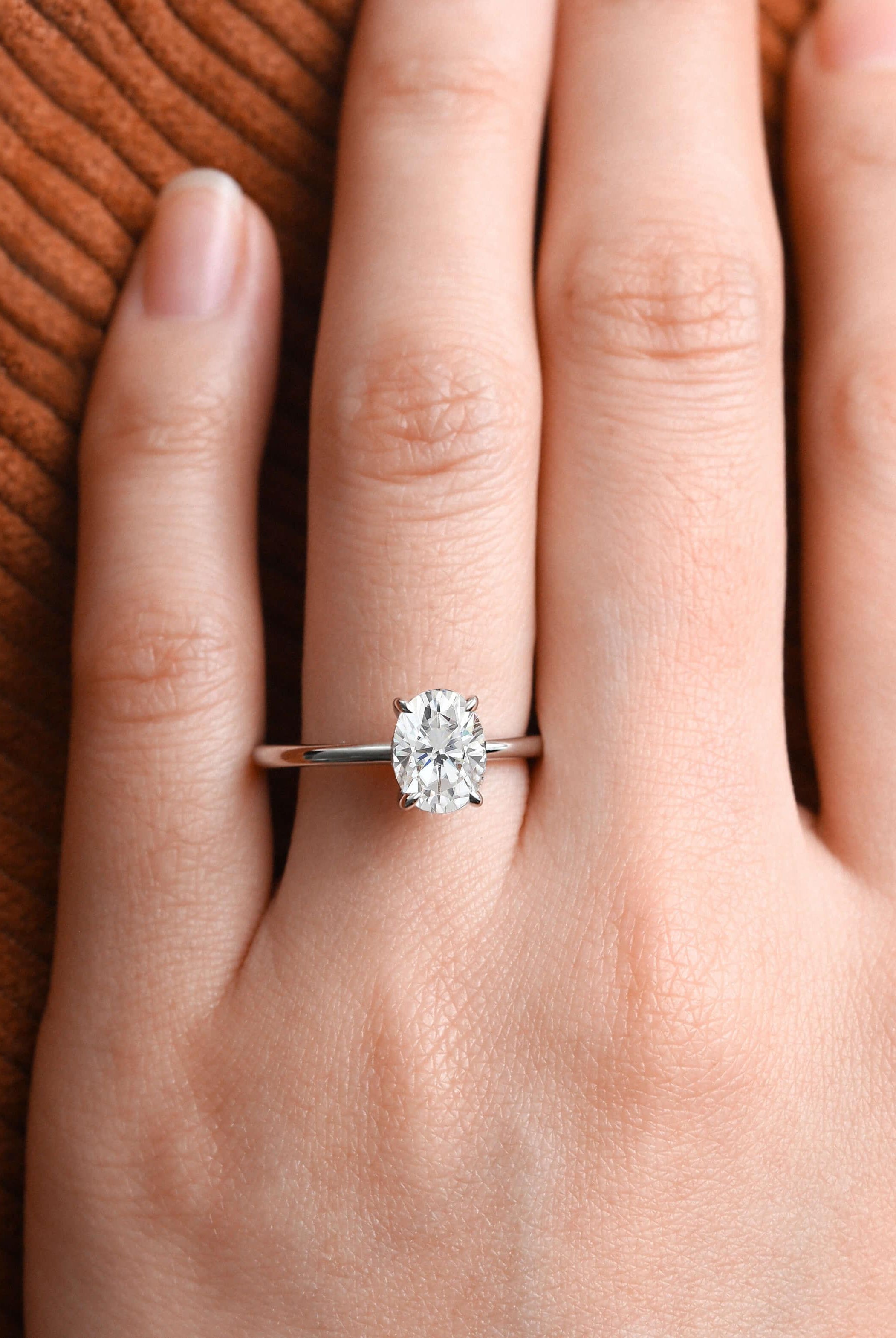 oval-cut-solitaire-moissanite-engagement-ring-8