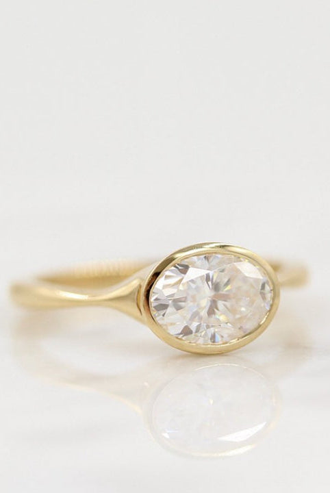 1.0ct East West Oval Moissanite Diamond Bezel Set Engagement Ring