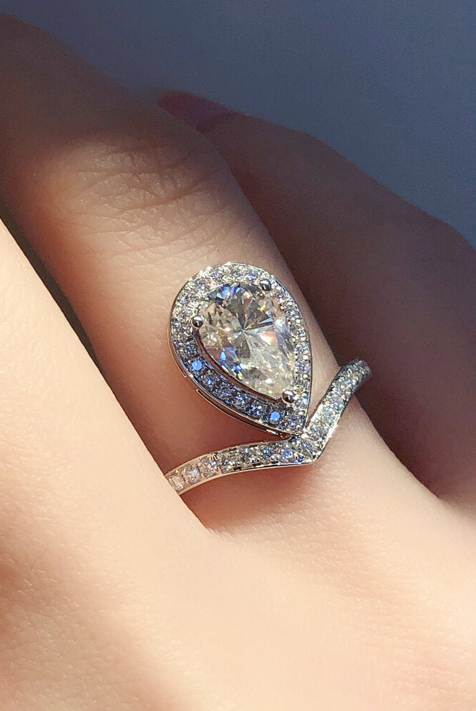 1-50-ct-pear-shaped-moissanite-halo-engagement-ring