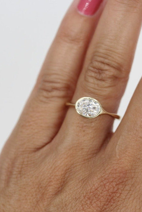 1.0ct East West Oval Moissanite Diamond Bezel Set Engagement Ring