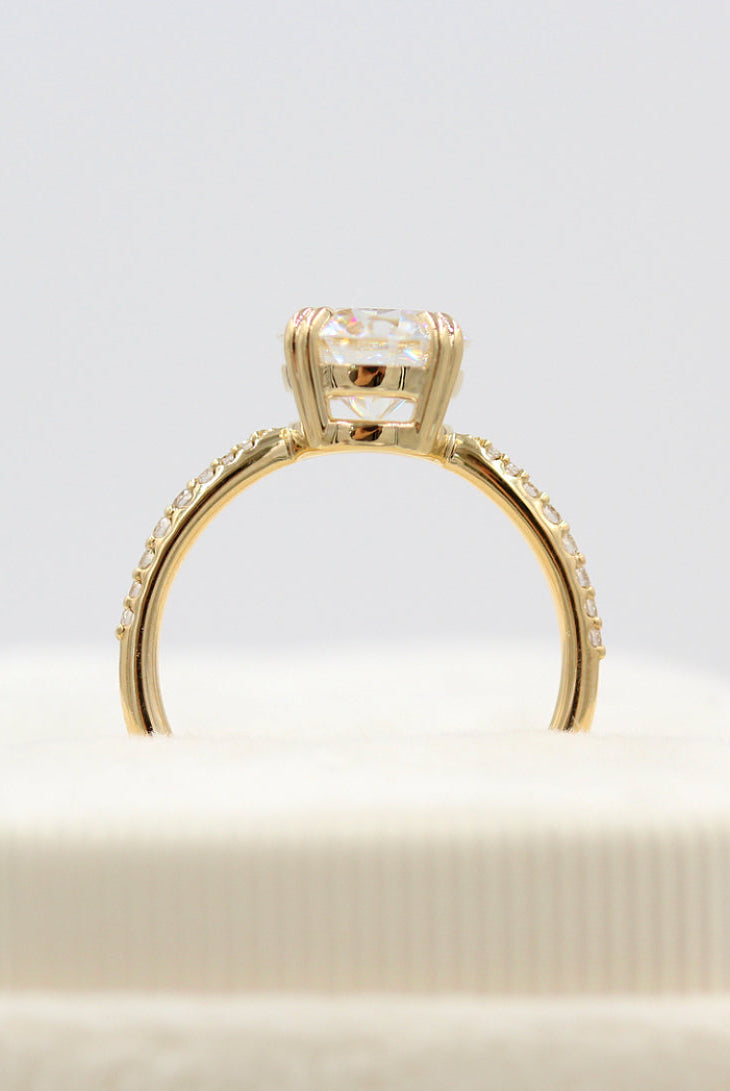 Vintage-inspired three-stone moissanite engagement rings under $500