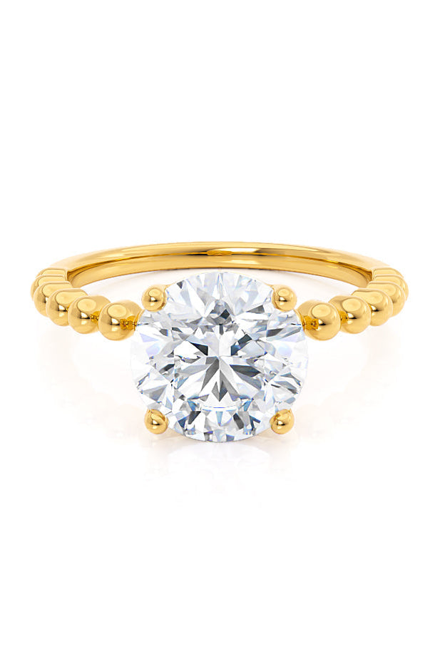 round-shaped-moissanite-solitaire-bubble-prong-engagement-ring