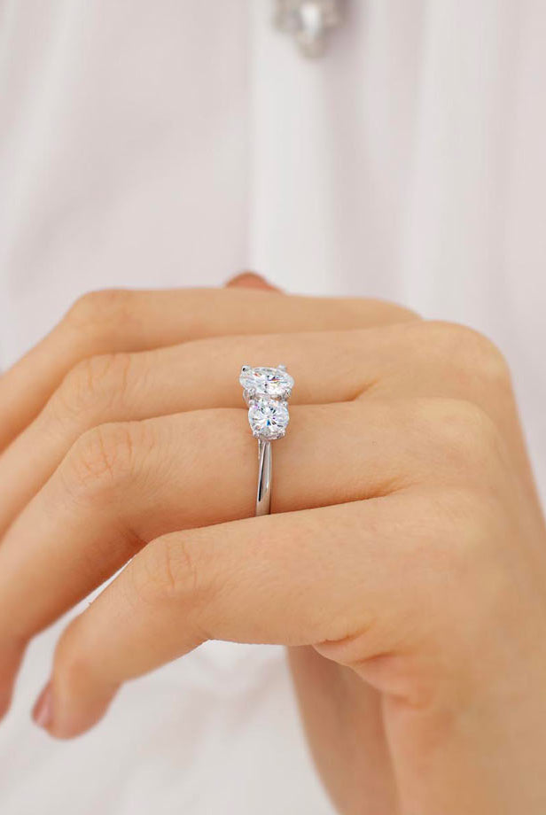 round-shaped-moissanite-three-stone-style-engagement-ring-3