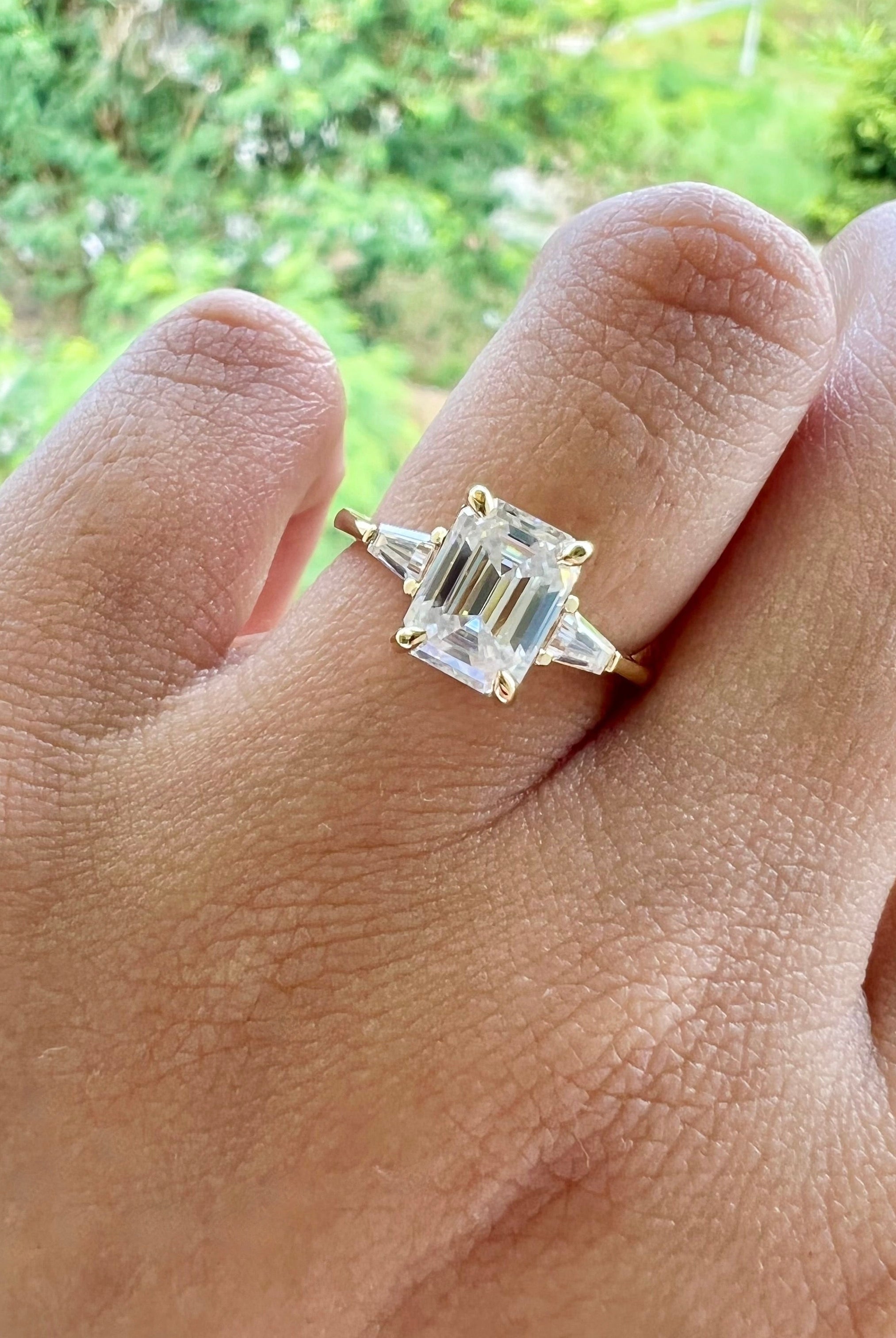 1-9-ct-emerald-cut-three-stone-moissanite-engagement-ring