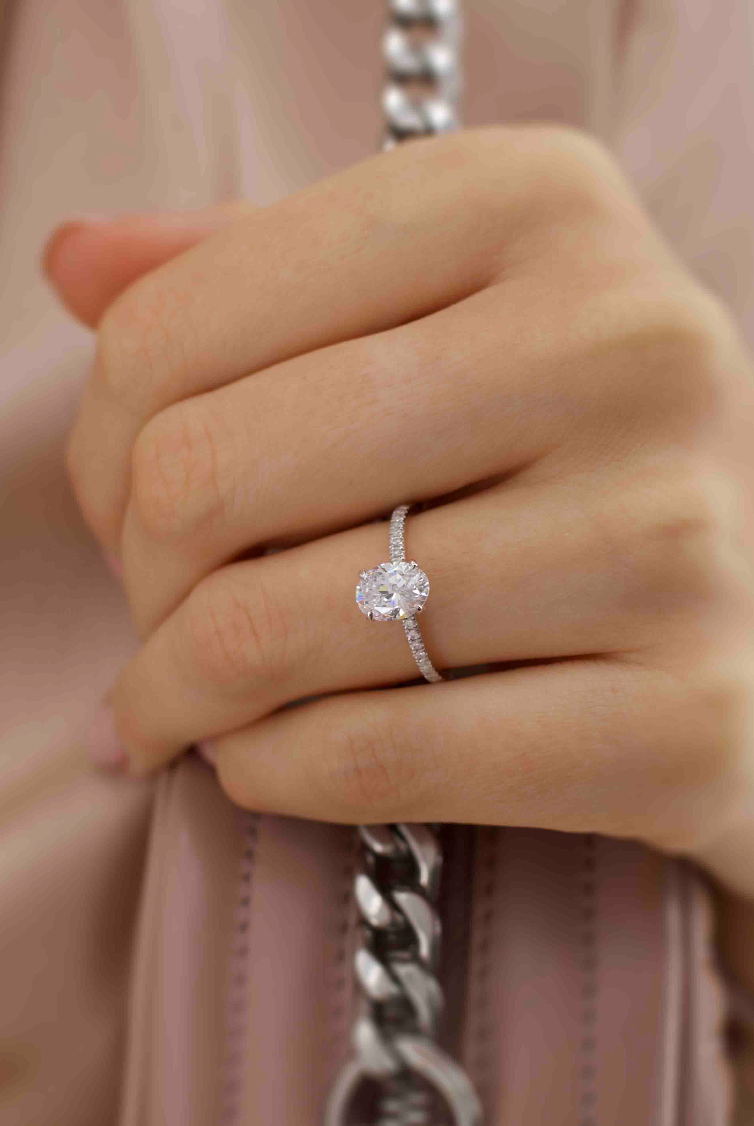 oval-shaped-moissanite-hidden-halo-style-engagement-ring-4