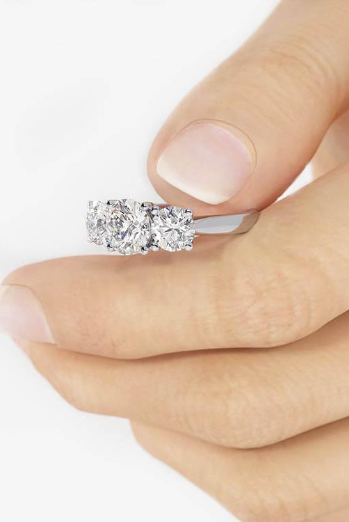 1-0-ct-round-shaped-moissanite-three-stone-style-engagement-ring-11