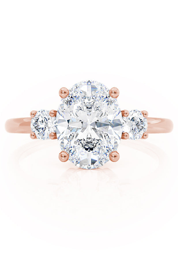 oval-shaped-moissanite-three-stone-style-engagement-ring-2