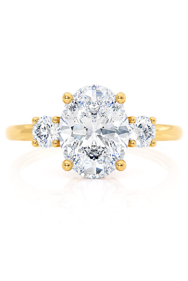 oval-shaped-moissanite-three-stone-style-engagement-ring