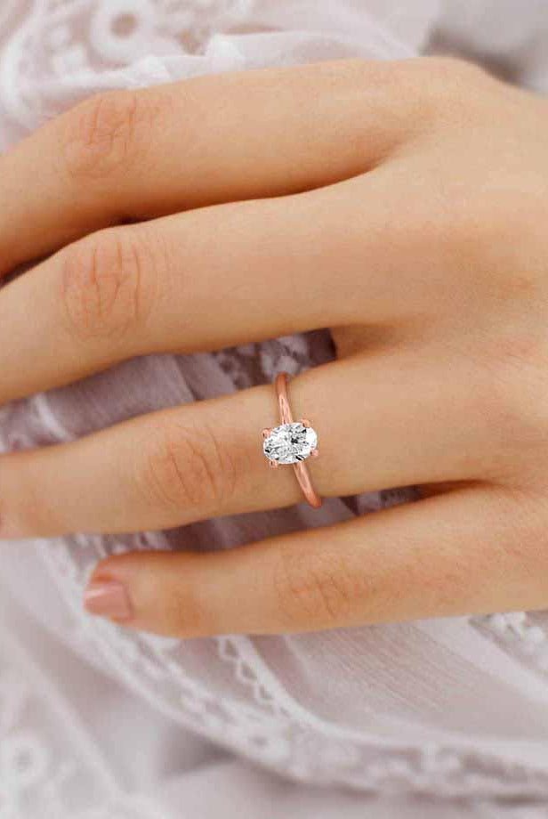 0-90-ct-oval-shaped-moissanite-solitaire-style-engagement-ring-5