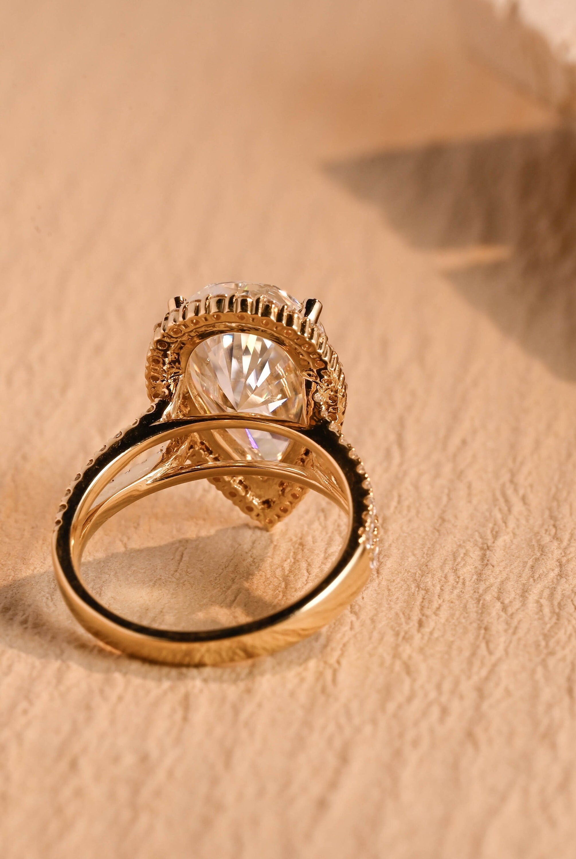 diamond halo pear shape moissanite ring