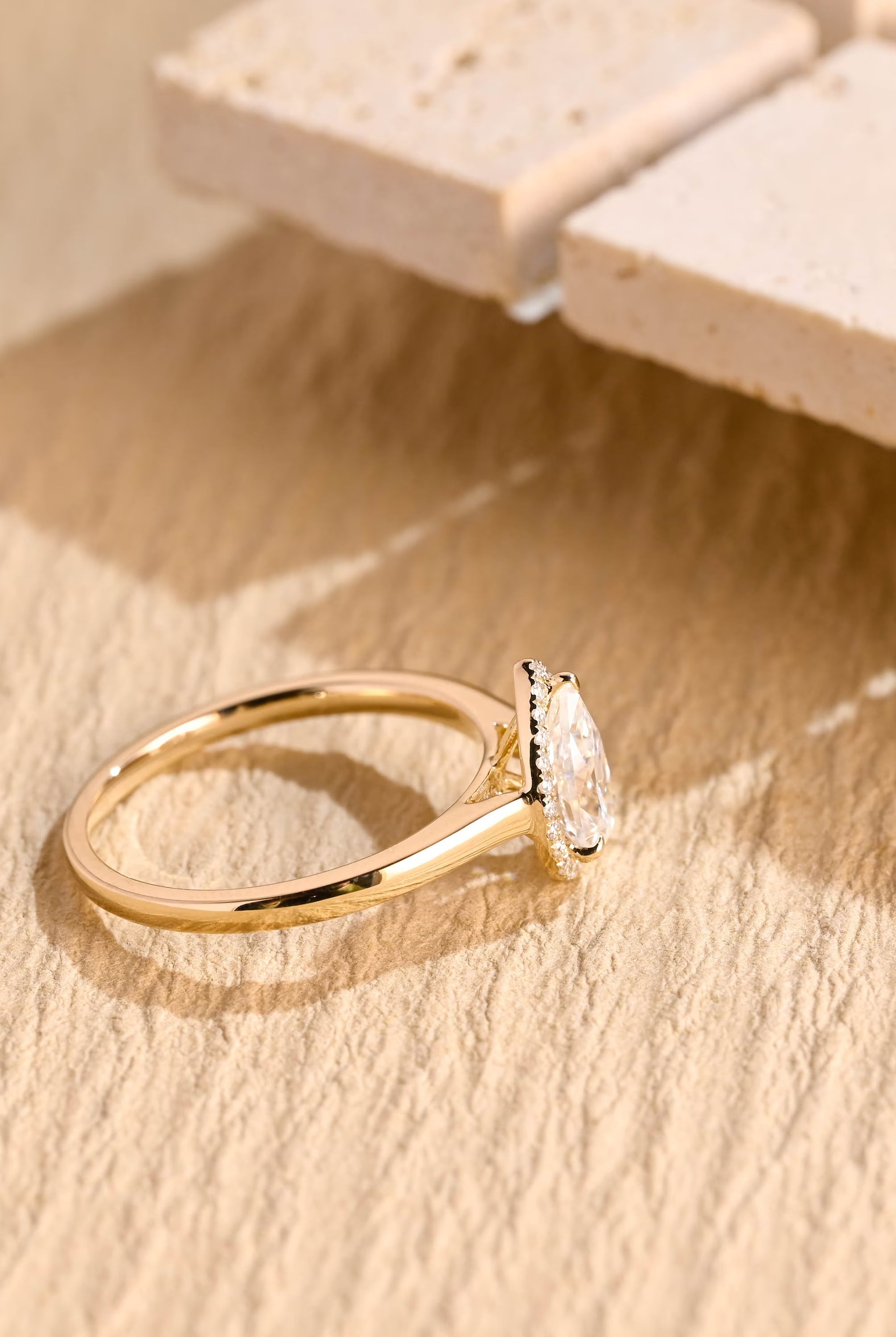 diamond halo pear moissanite engagement ring
