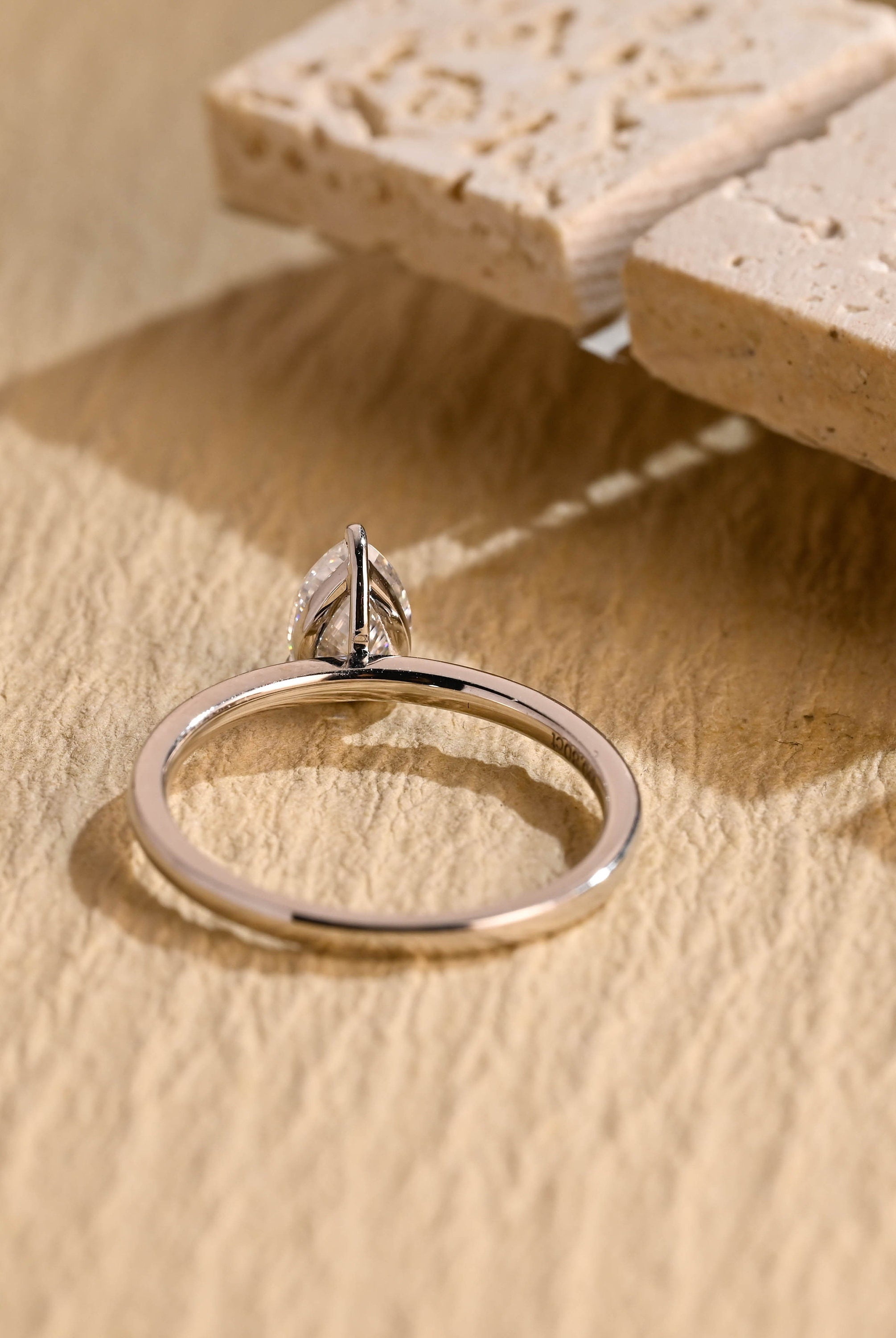 diamond alternative pear solitaire engagement ring
