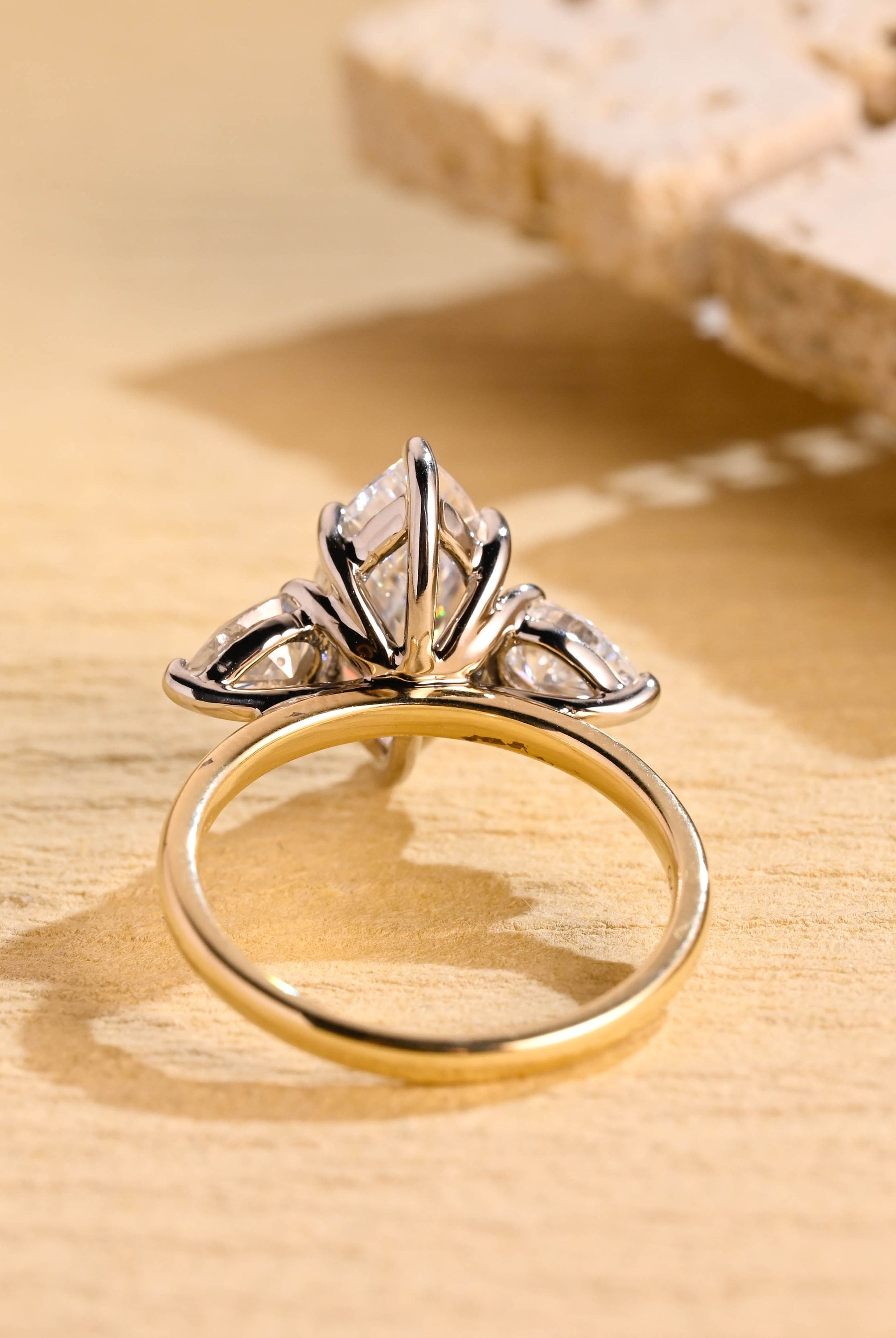 Classic Three Stone Engagement Ring with Marquise Center