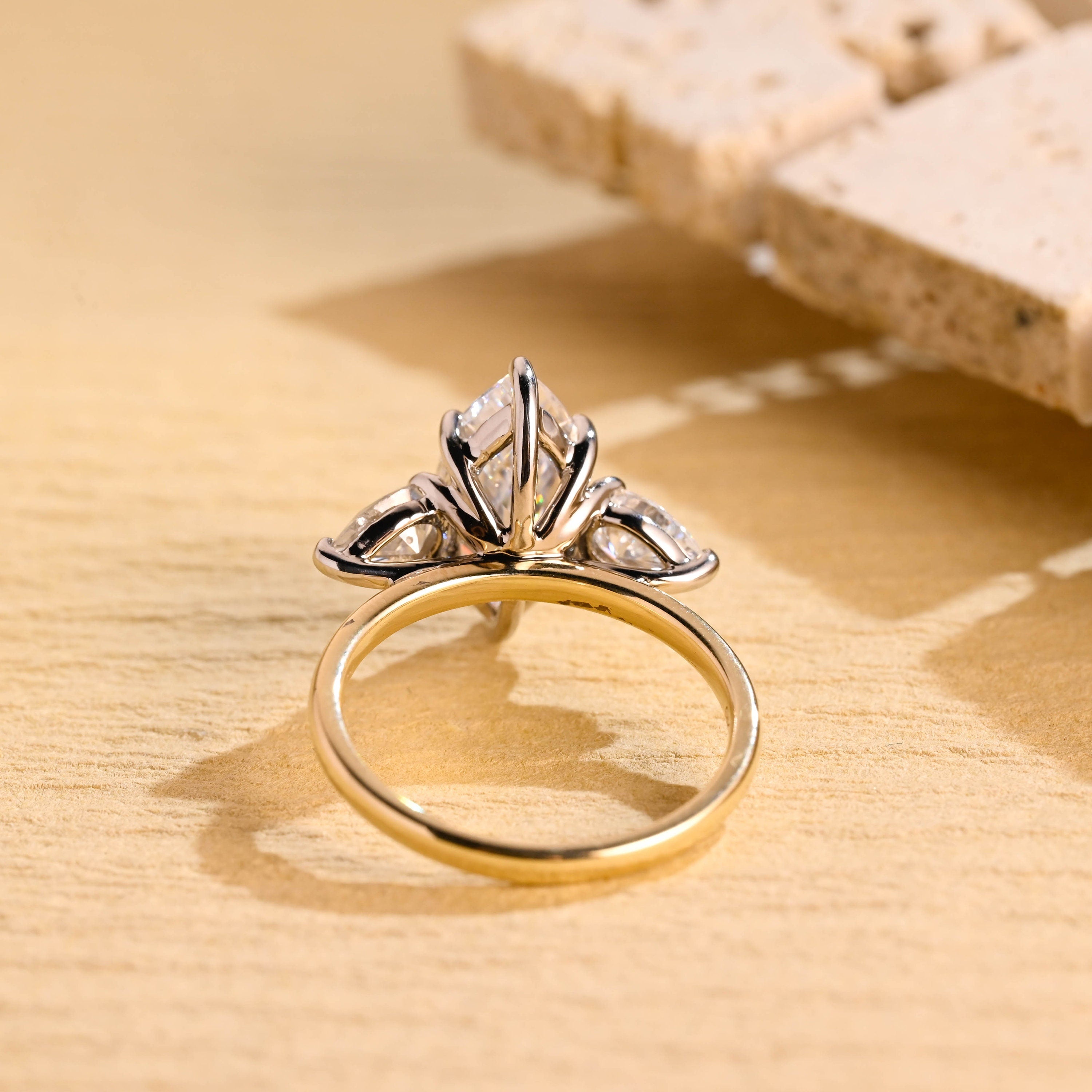 Classic Three Stone Engagement Ring with Marquise Center