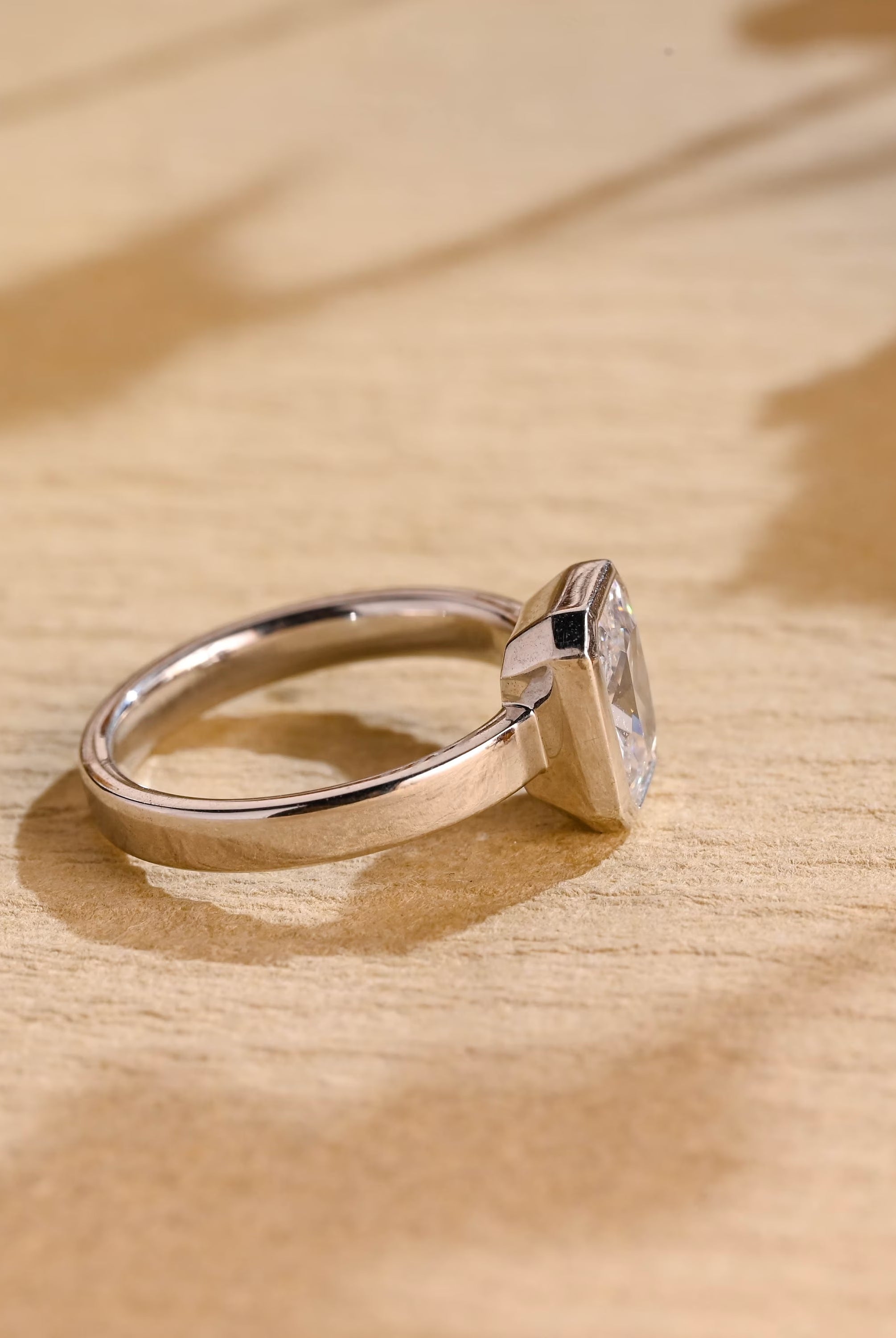 contemporary moissanite engagement ring bezel style