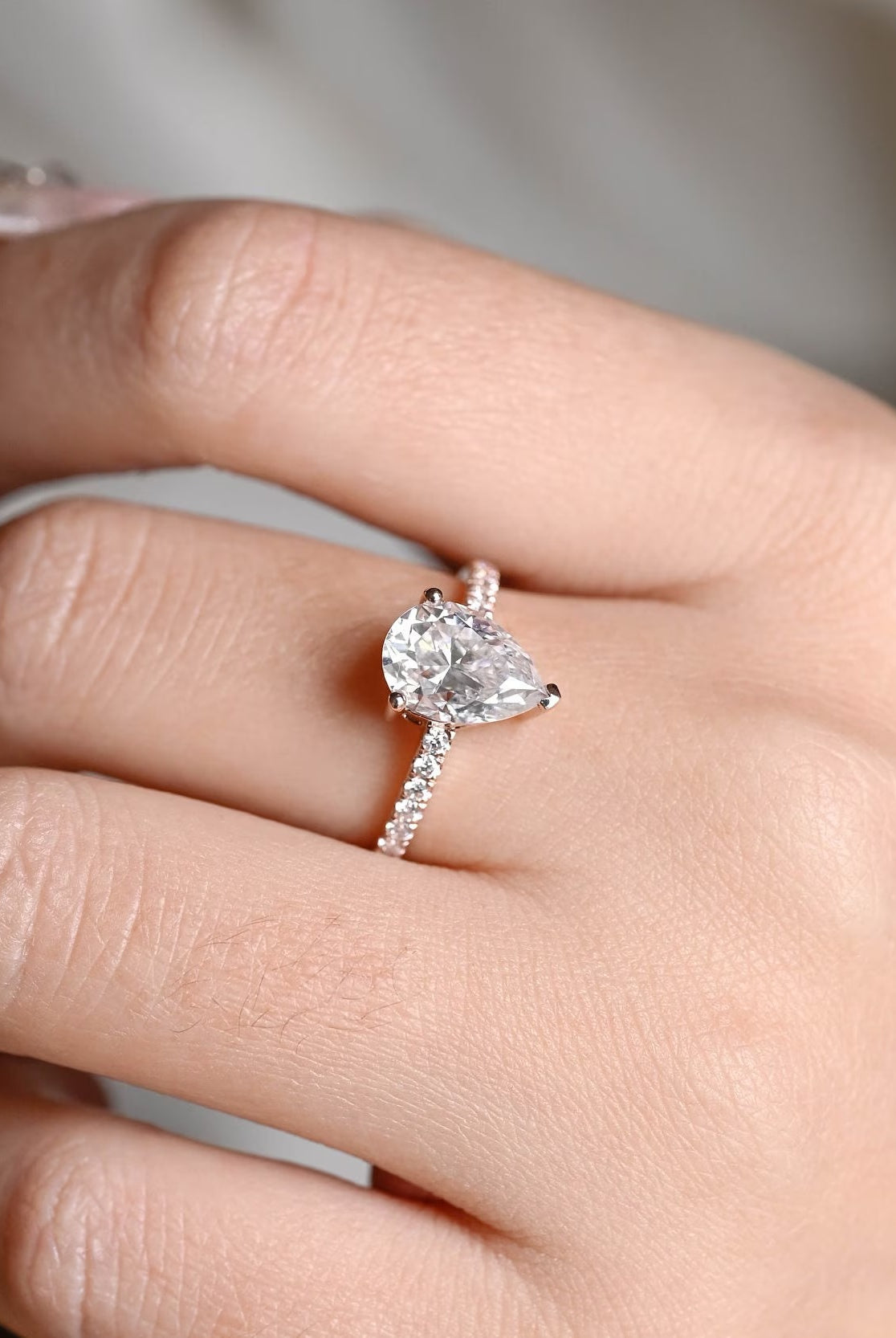 designer pear pavé moissanite ring