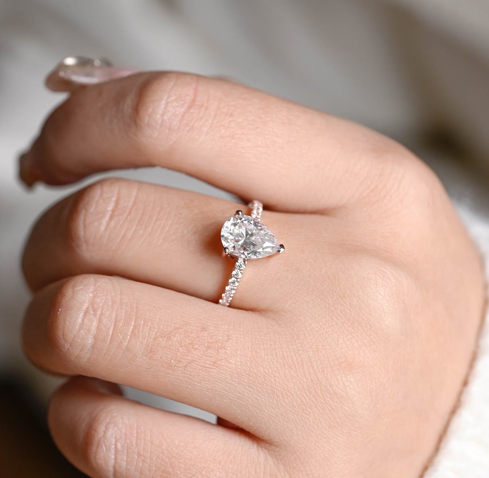 designer pear pavé moissanite ring