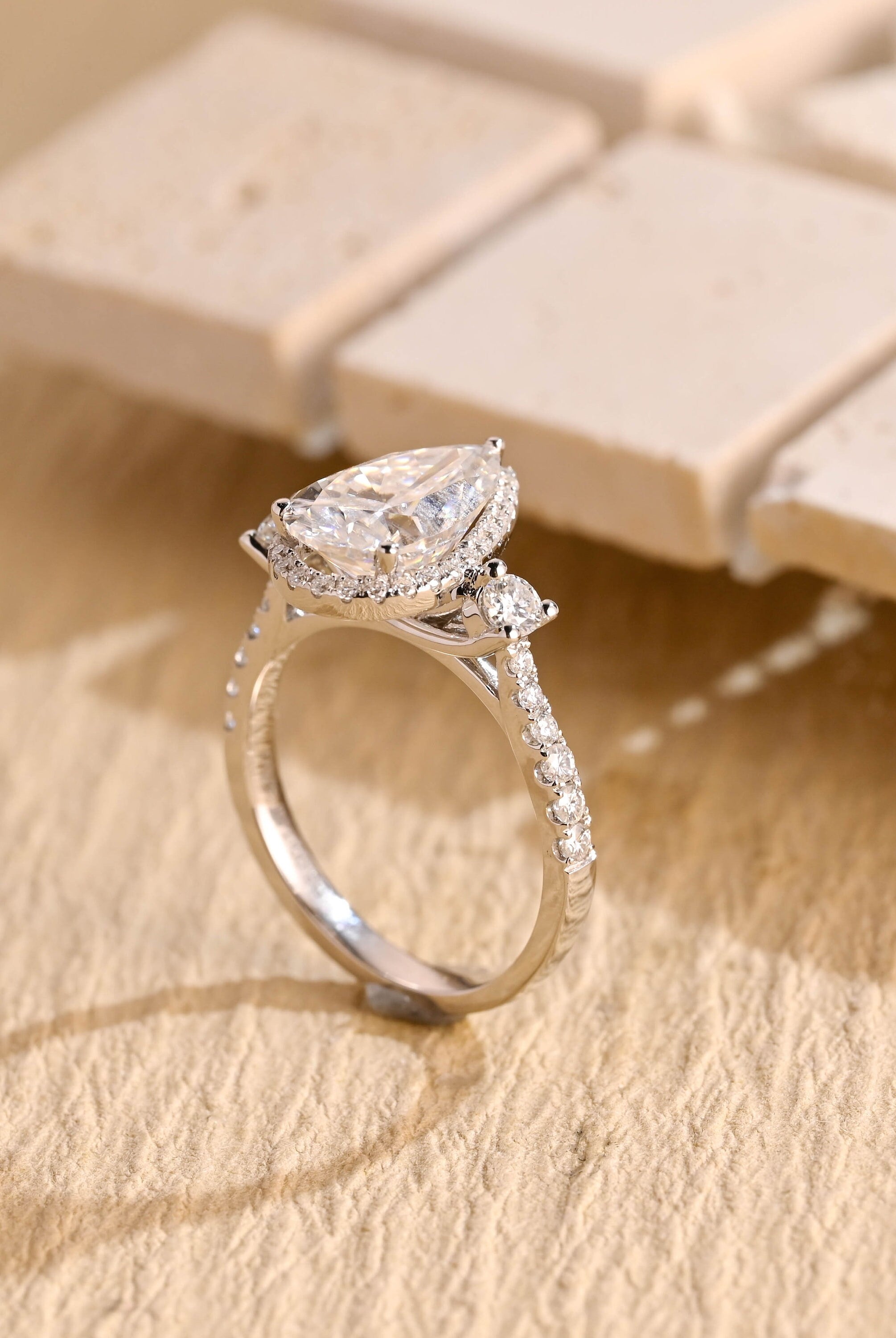 pear cut three stone lab grown engagement ring USA 56