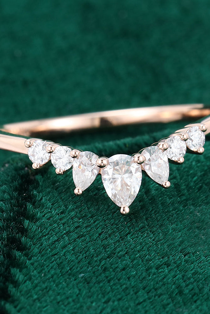 round-pear-moissanite-curved-wedding-band