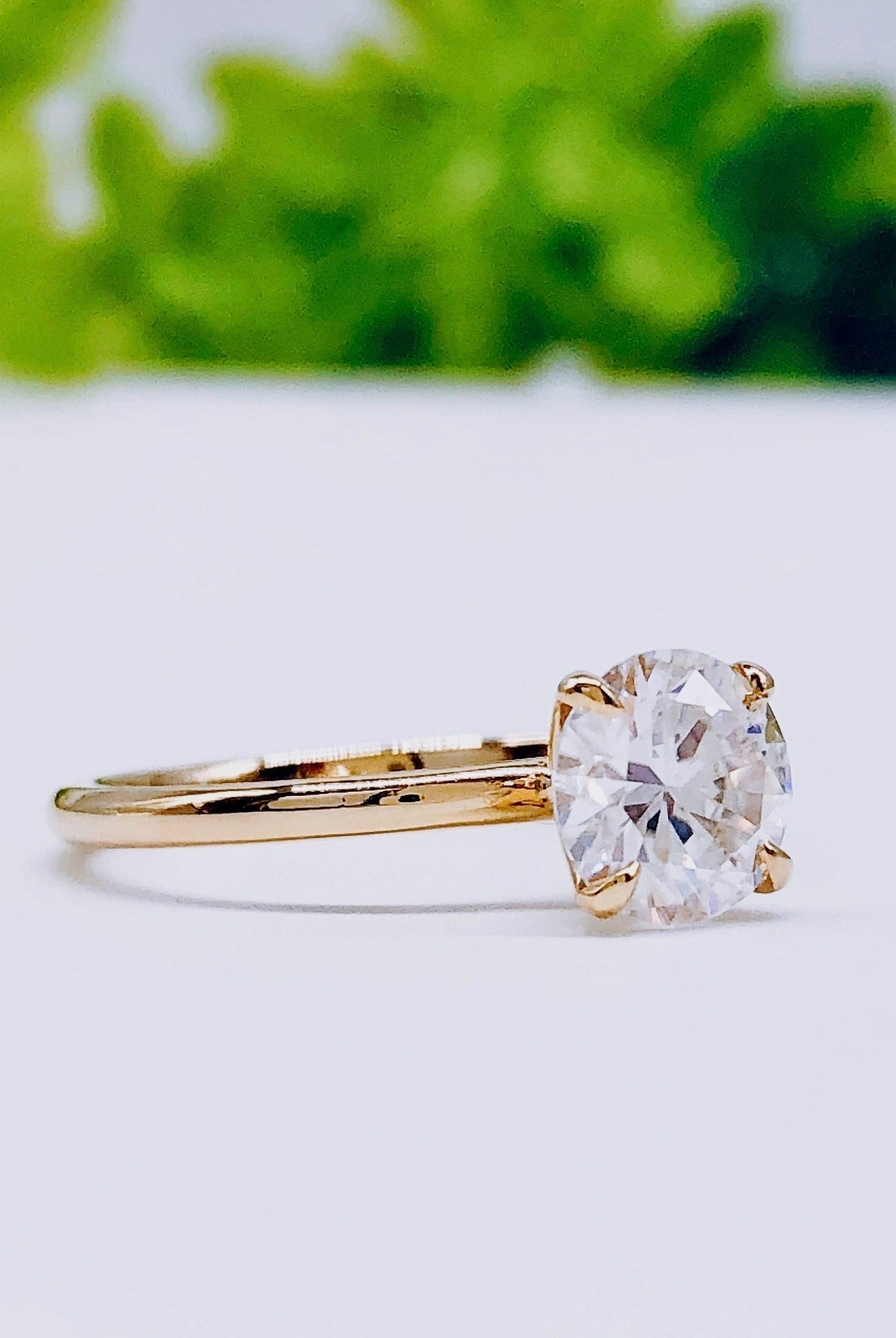 round-cut-solitaire-moissanite-engagement-ring