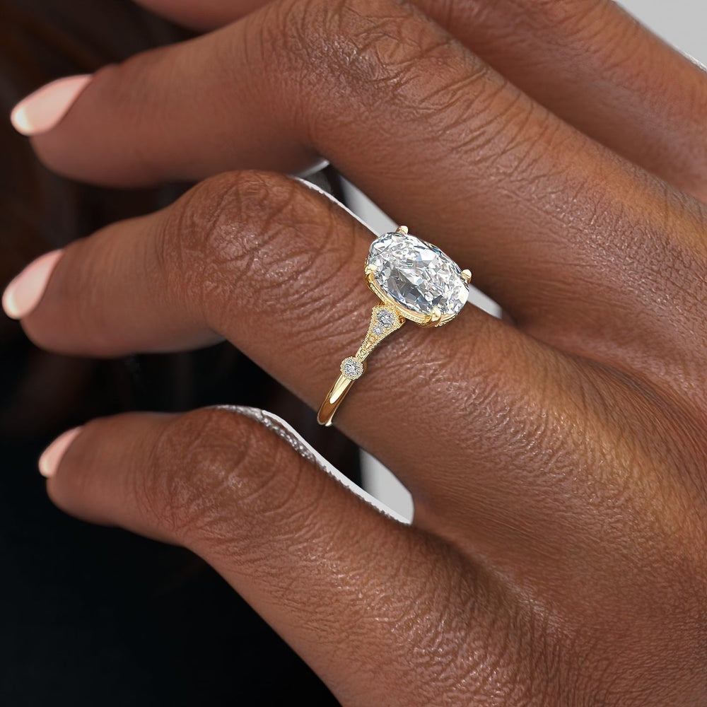 oval-cut-solitaire-milgrain-pave-set-moissanite-engagement-ring