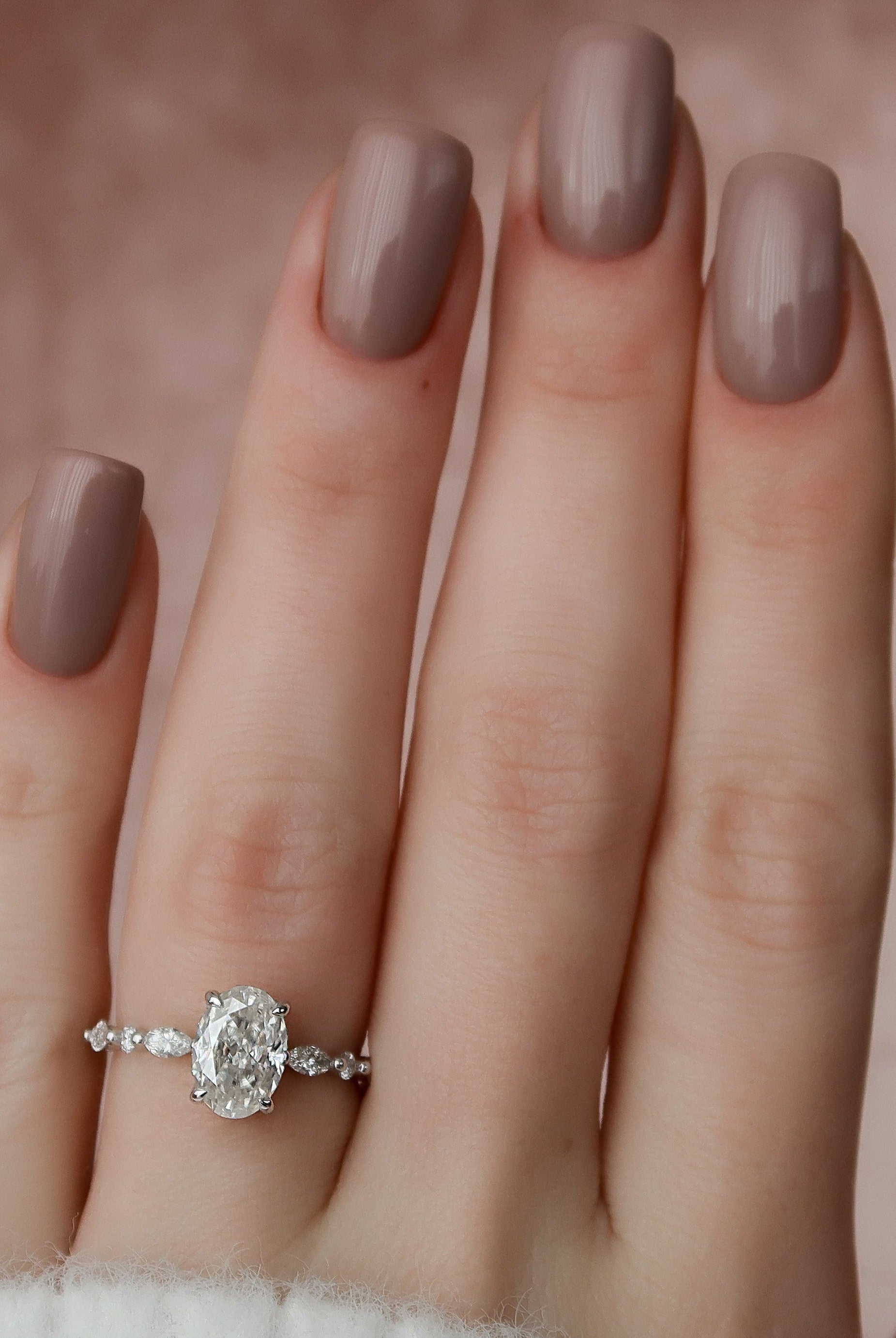 Oval Cut Moissanite Ring Featuring Hidden Halo Detail