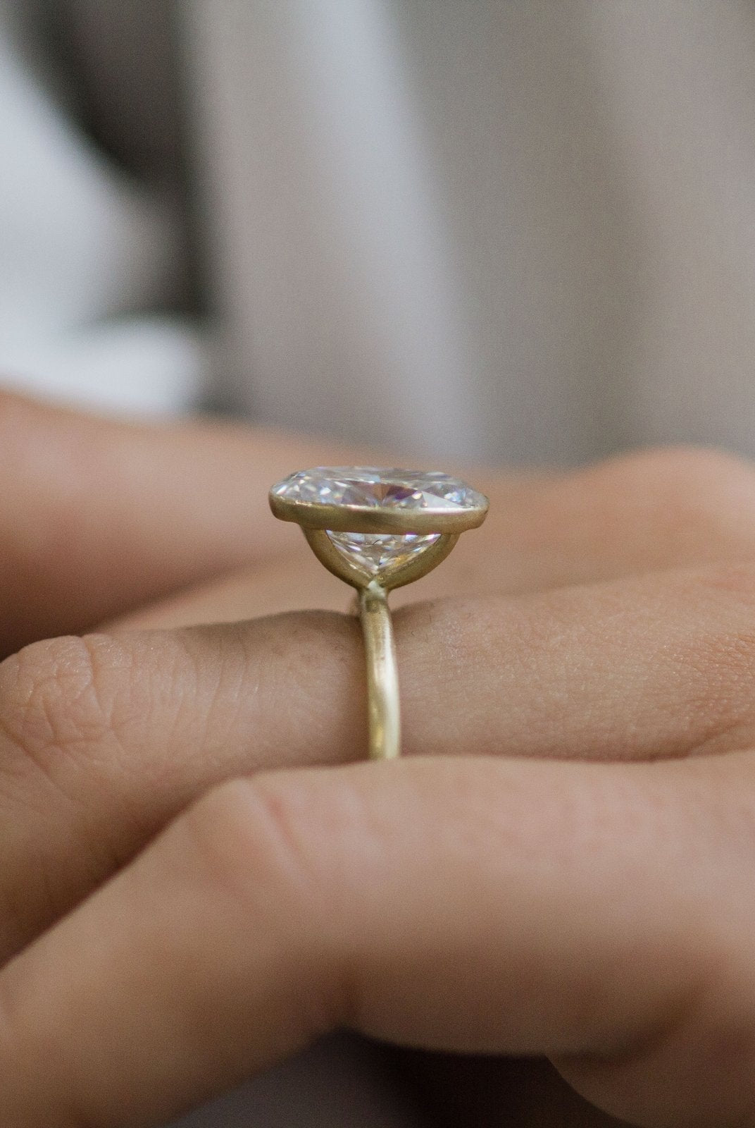 Oval Bezel Engagement Ring
