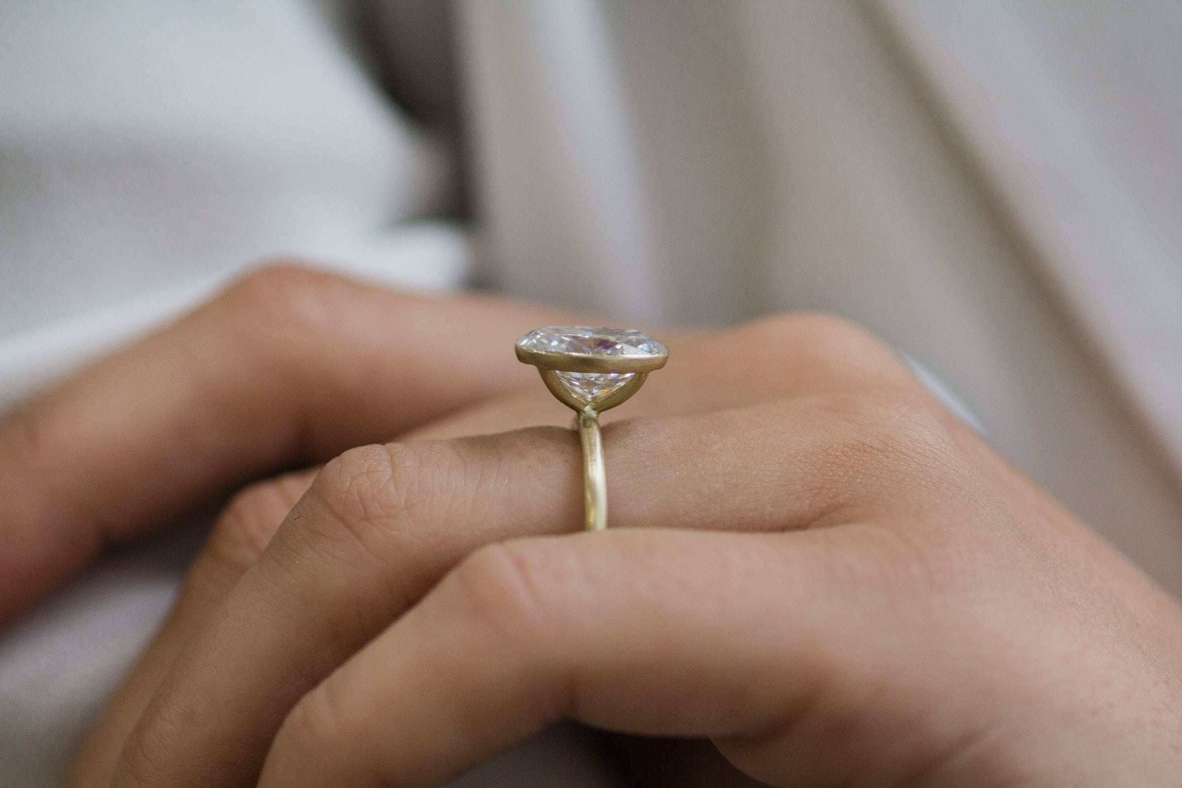 Oval Bezel Engagement Ring