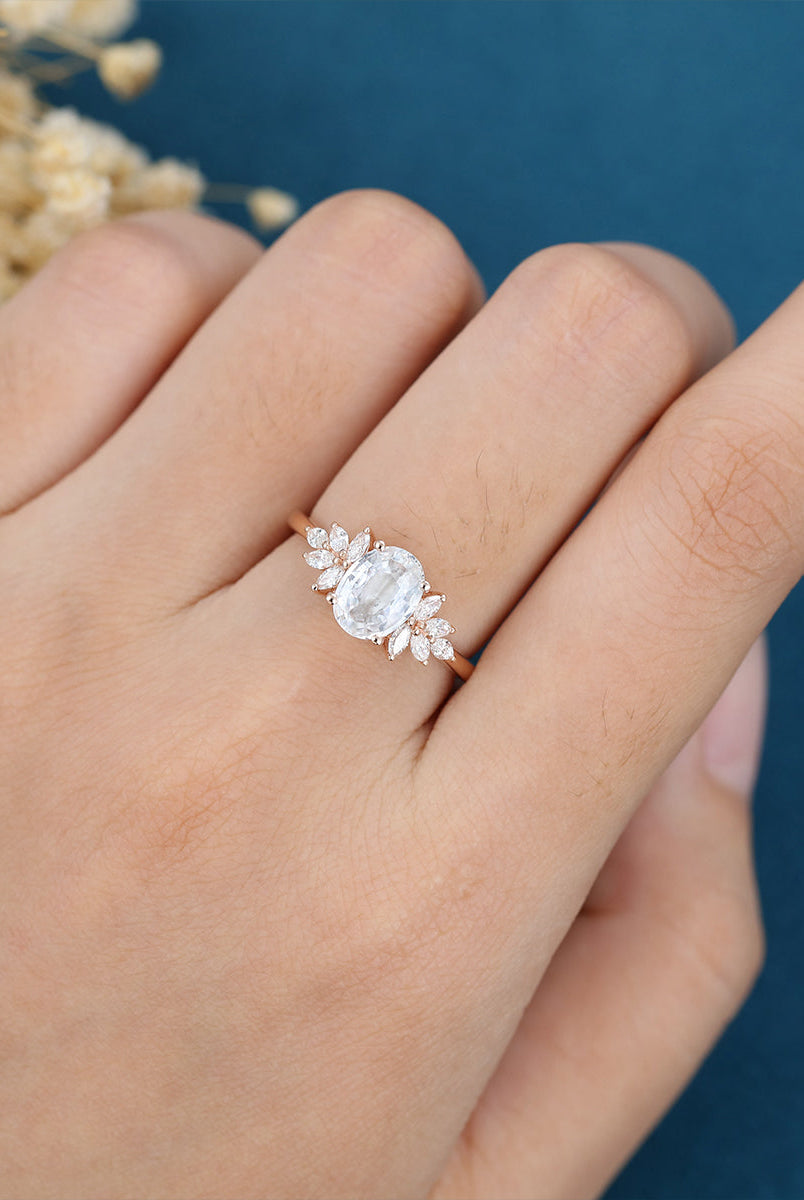 oval-shaped-moissanite-cluster-engagement-ring-18