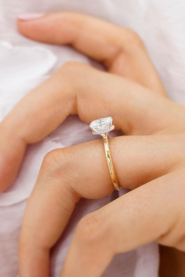 elongated-cushion-shaped-moissanite-hidden-halo-style-engagement-ring-3