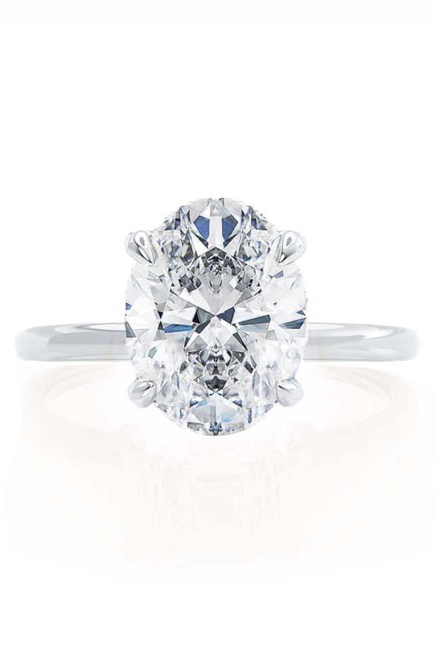oval-shaped-moissanite-hidden-halo-style-engagement-ring