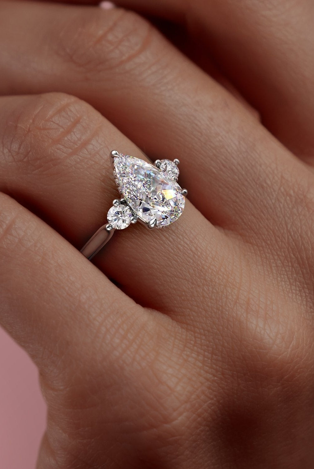 2-0-ct-pear-cut-three-stone-moissanite-engagement-ring