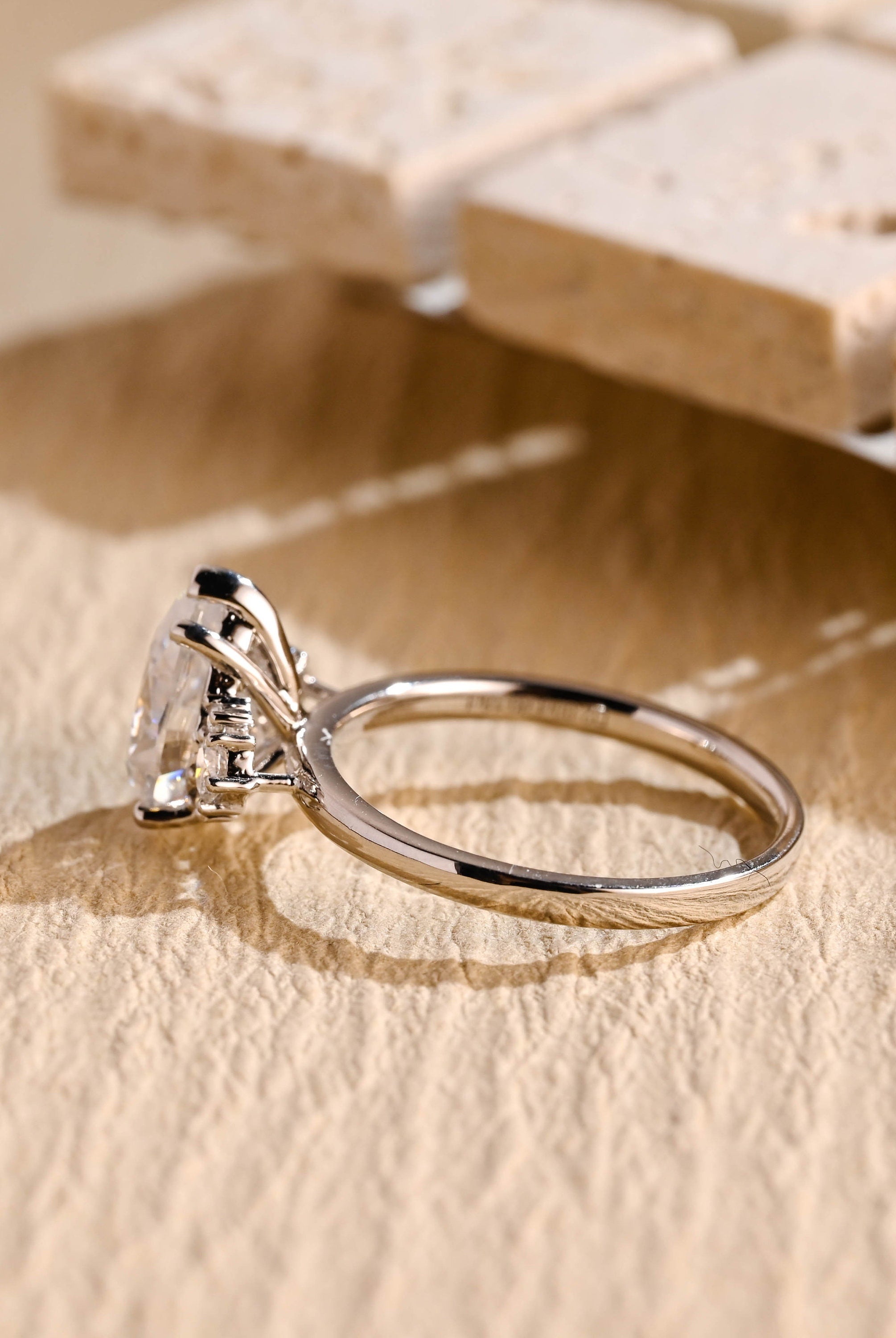 pear cut cluster engagement ring moissanite