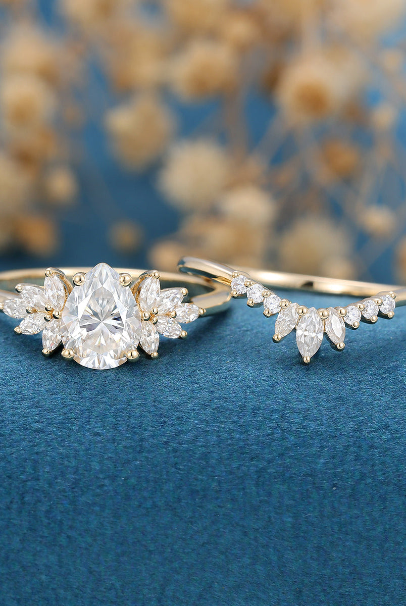 1-0-ct-oval-shaped-moissanite-cluster-bridal-set